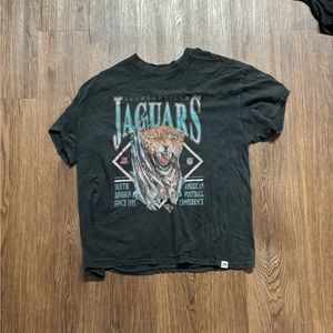 VINTAGE NFL Washed black jaguars tshirt. Mens size L